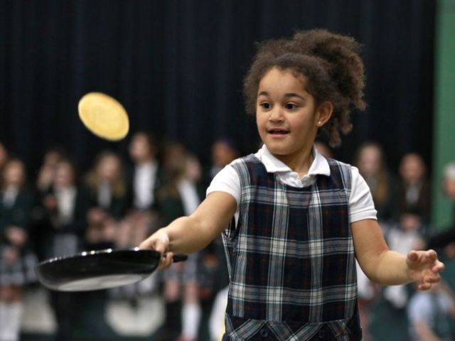 Pancake Race, Run &amp; Flip last year on Shrove Tuesday at St. Richard’s Episcopal School, Indianapolis. The term refers to being absolved from sins after Confession the day before Lent begins, and the pancake tradition relates to consuming the last of the fat before the season of abstinence and fasting, ending with Easter. (Kelly Wilkinson/The Indianapolis Star)